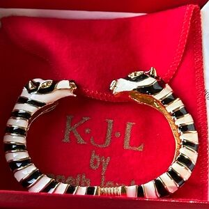 Kenneth Jay Lane enamel zebra  hinged bracelet with original pouch and box